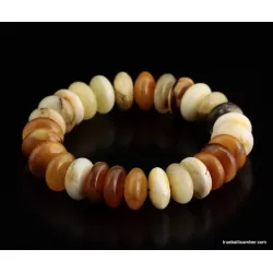 Unique buttons Baltic amber bracelet 7in