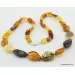 Cut stones Baltic amber knotted necklace